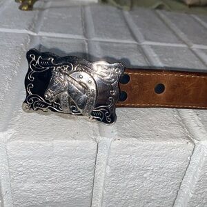 Wranglers kids belt with horse buckle.